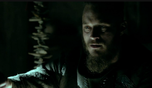 History Channel's Viking screenshot showing Ragnar and driftwood garland